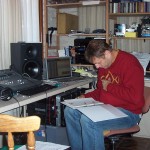 At The Villa Armadilla 2006; dmc studying a track guide before overdubbing